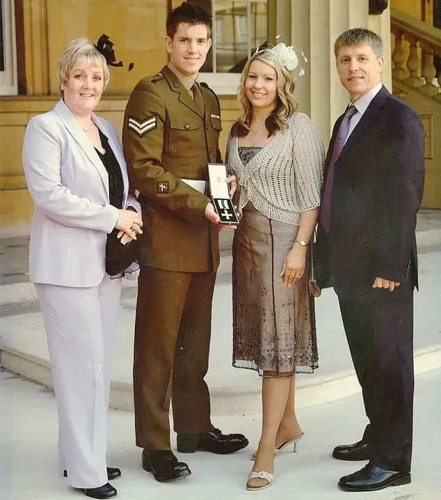 A man in a military uniform stands between two women and a man in a suit