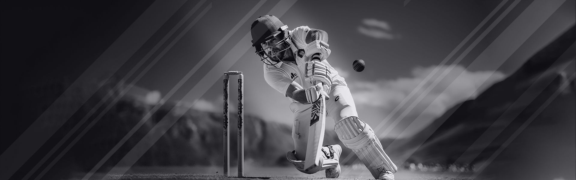 A black and white photo of a cricket player hitting a ball.