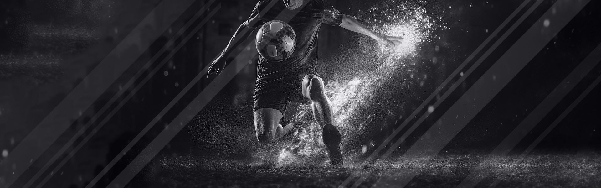 A black and white photo of a soccer player kicking a soccer ball in the water.
