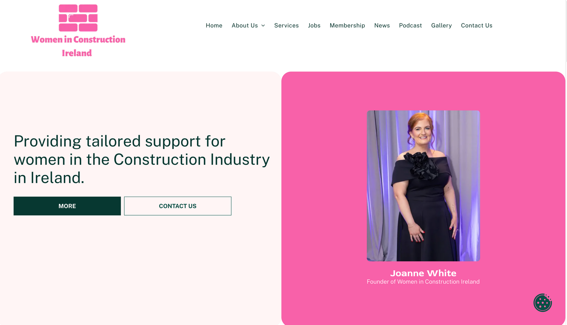 Women in Construction Ireland website. A woman stands in front of a pink square, smiling.