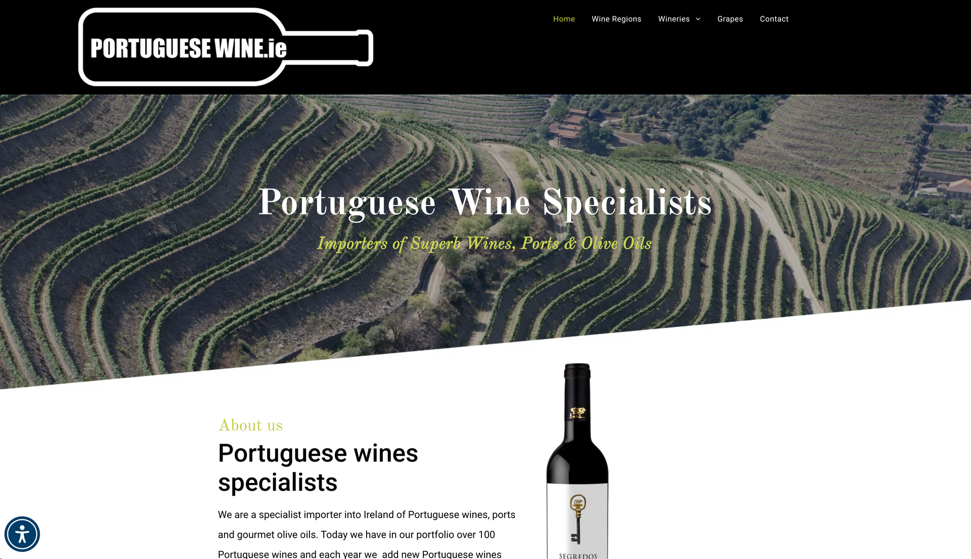 Website banner: PortugueseWine.io with vineyard landscape and wine bottle.