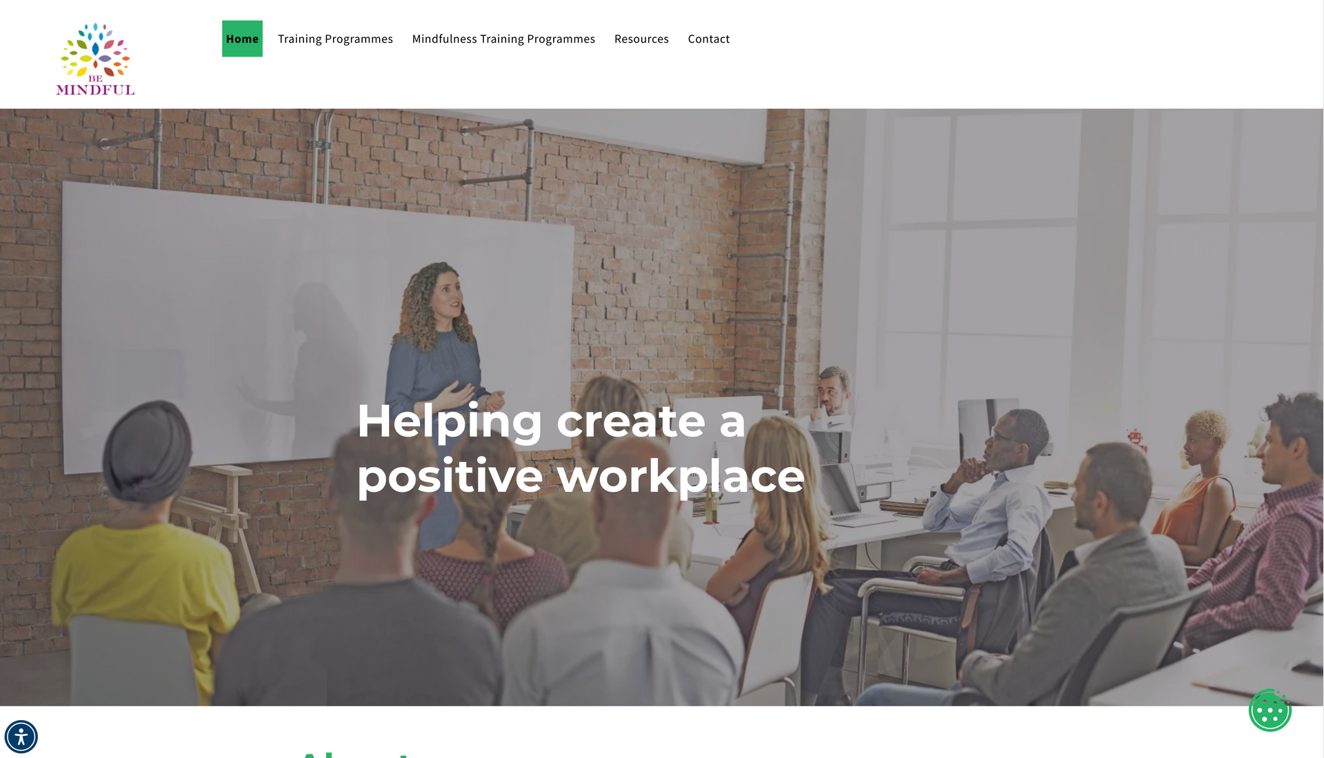 Woman leading a training session in a modern office with diverse attendees.