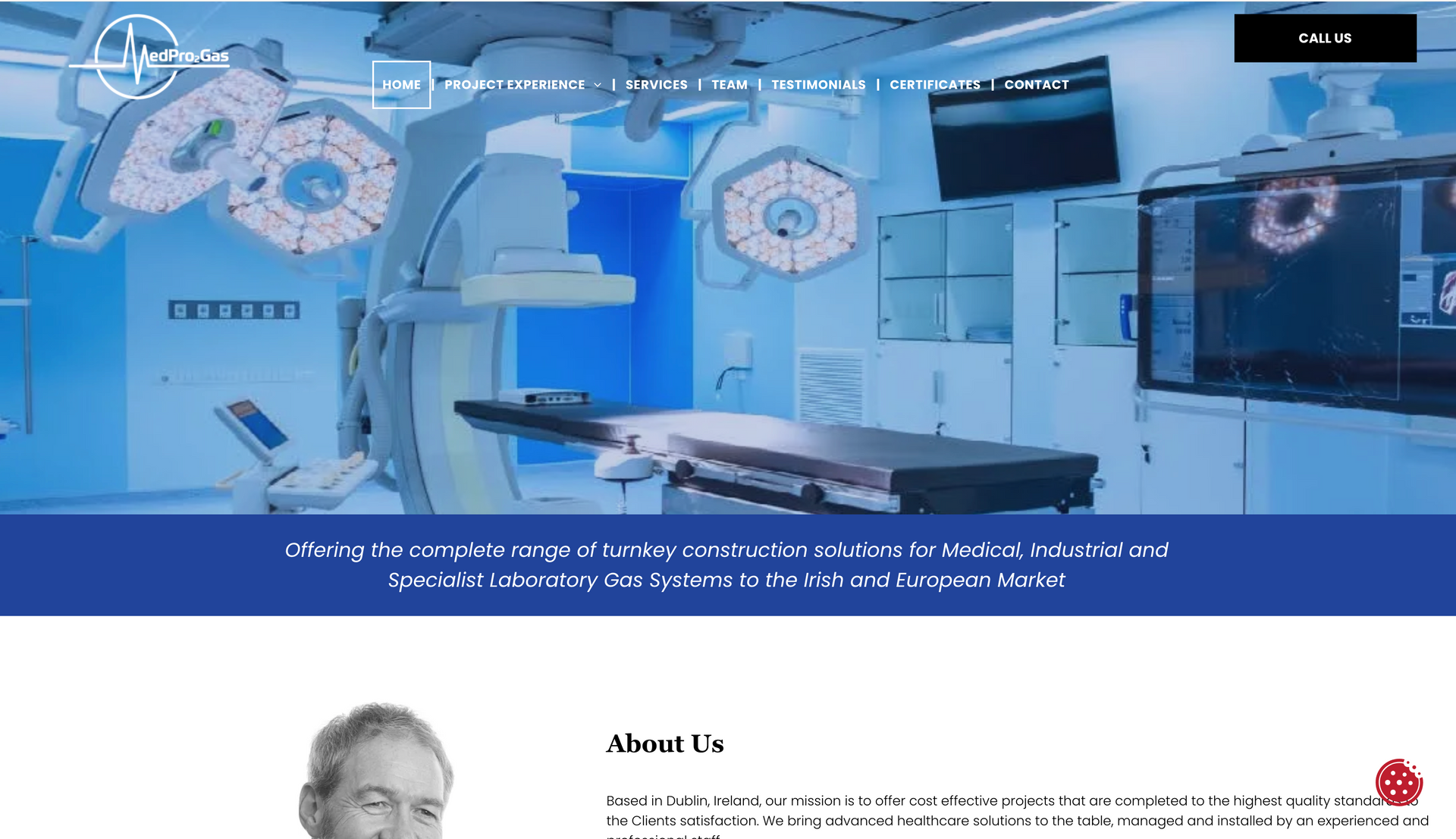 Surgical room with bright lights and medical equipment. Blue and white color scheme.