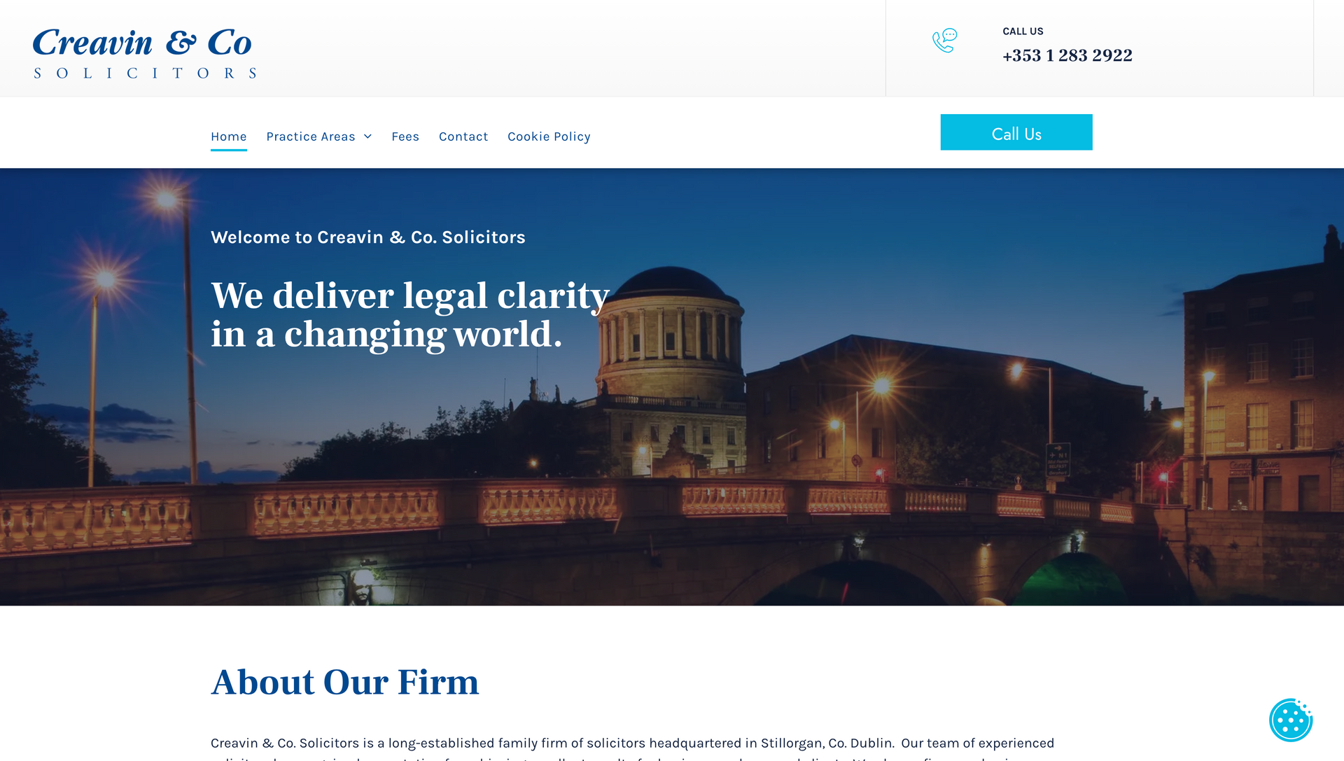 Website homepage for Creane & Co law firm with a bridge and building at night.