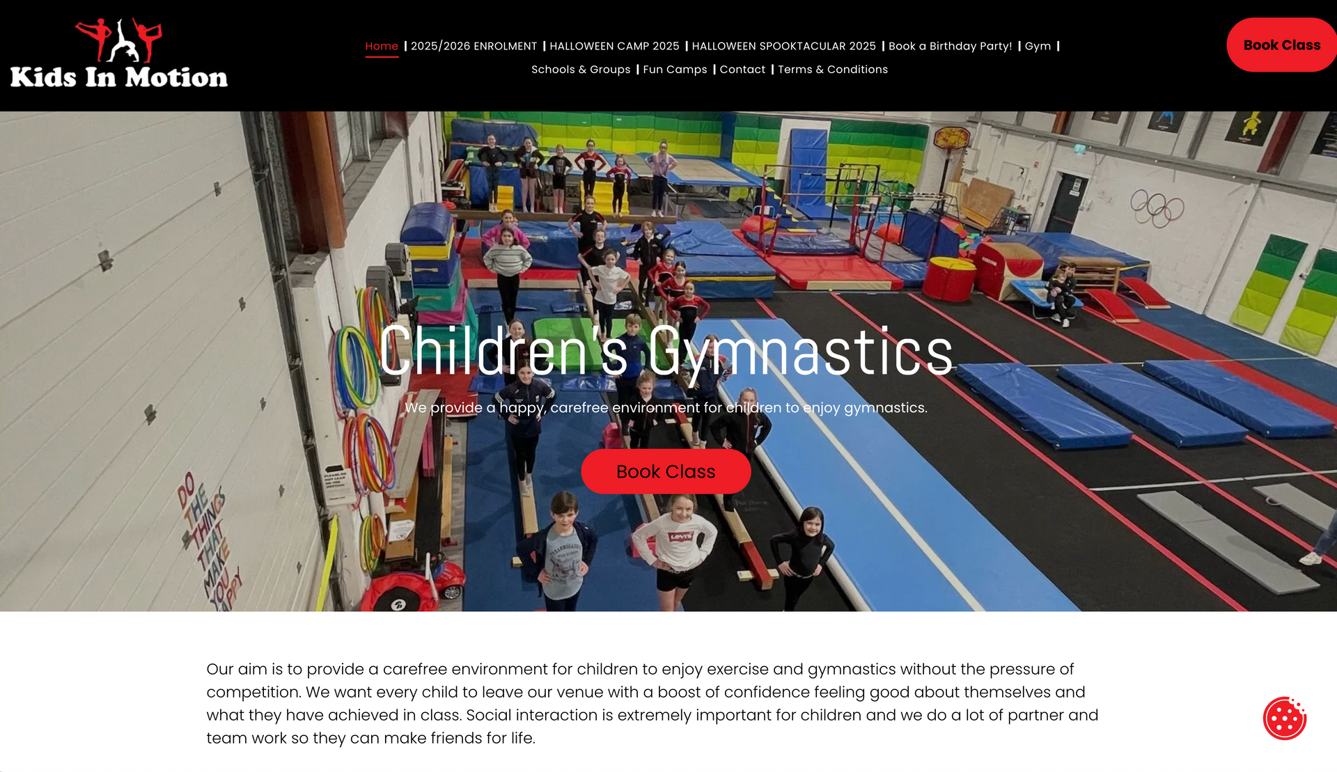Children doing gymnastics in a gym; the words 