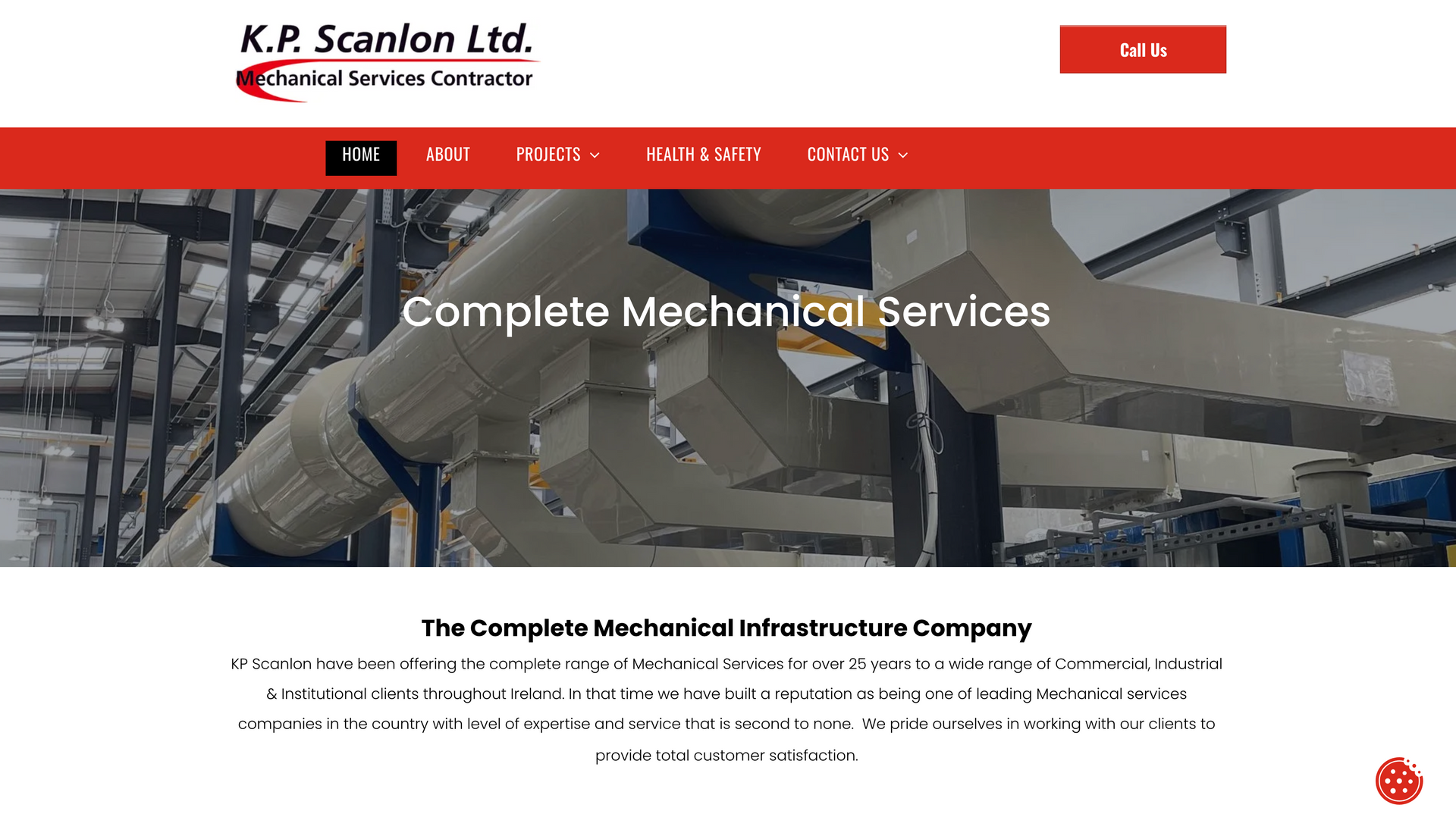K.P. Scanlon Ltd. website homepage with red banner and industrial mechanical piping.