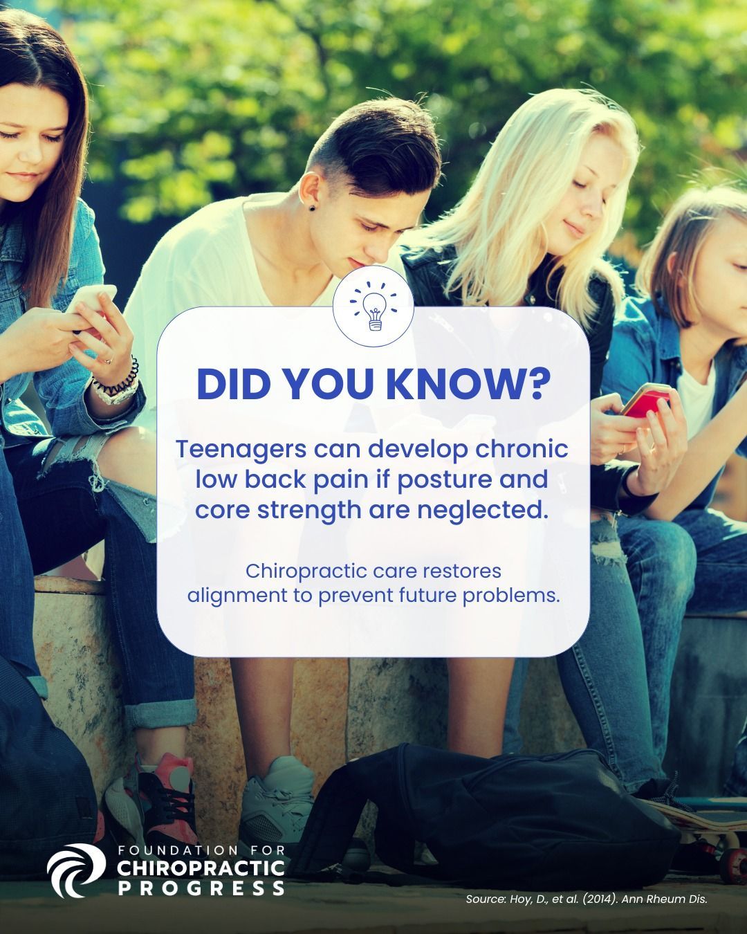 Group of teenagers sitting together looking down at smartphones with poor posture