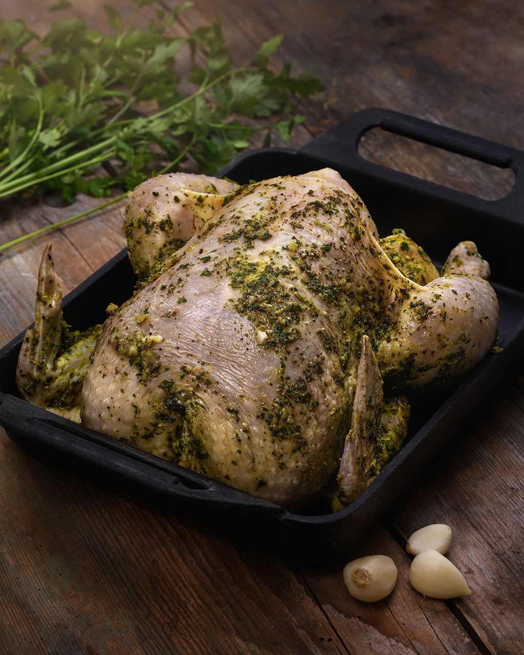 Young chicken in garlic and herbs marinade