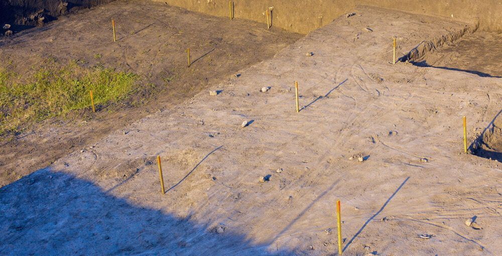 Land Site Marked with Sticks — Bustin' Free Earthworks in Bathurst, NSW