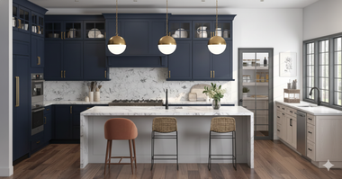 Navy blue kitchen with marble countertops, gold accents, and a central island with stools.