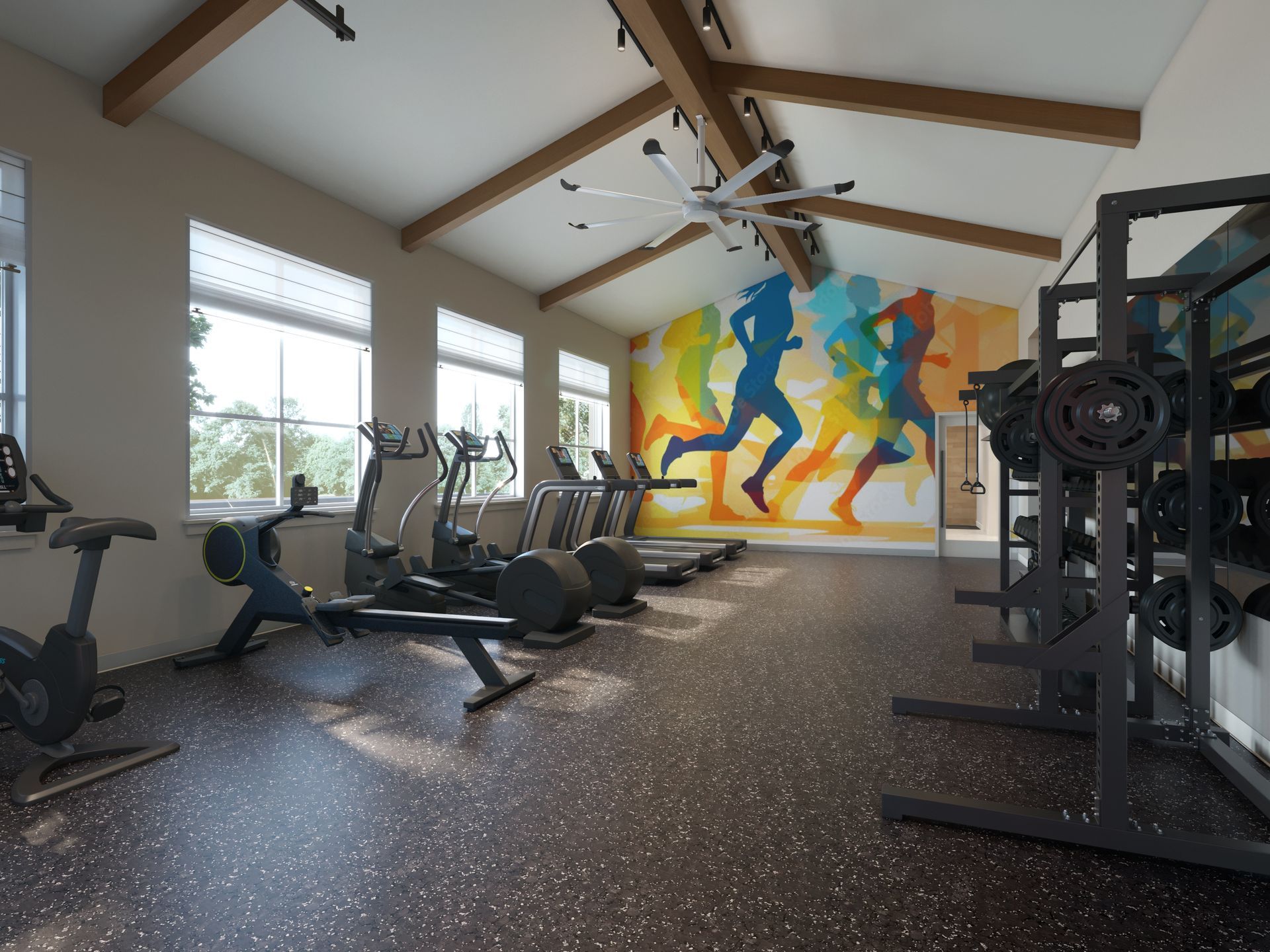 24-hour fitness center with Peloton bikes and an open-air gate