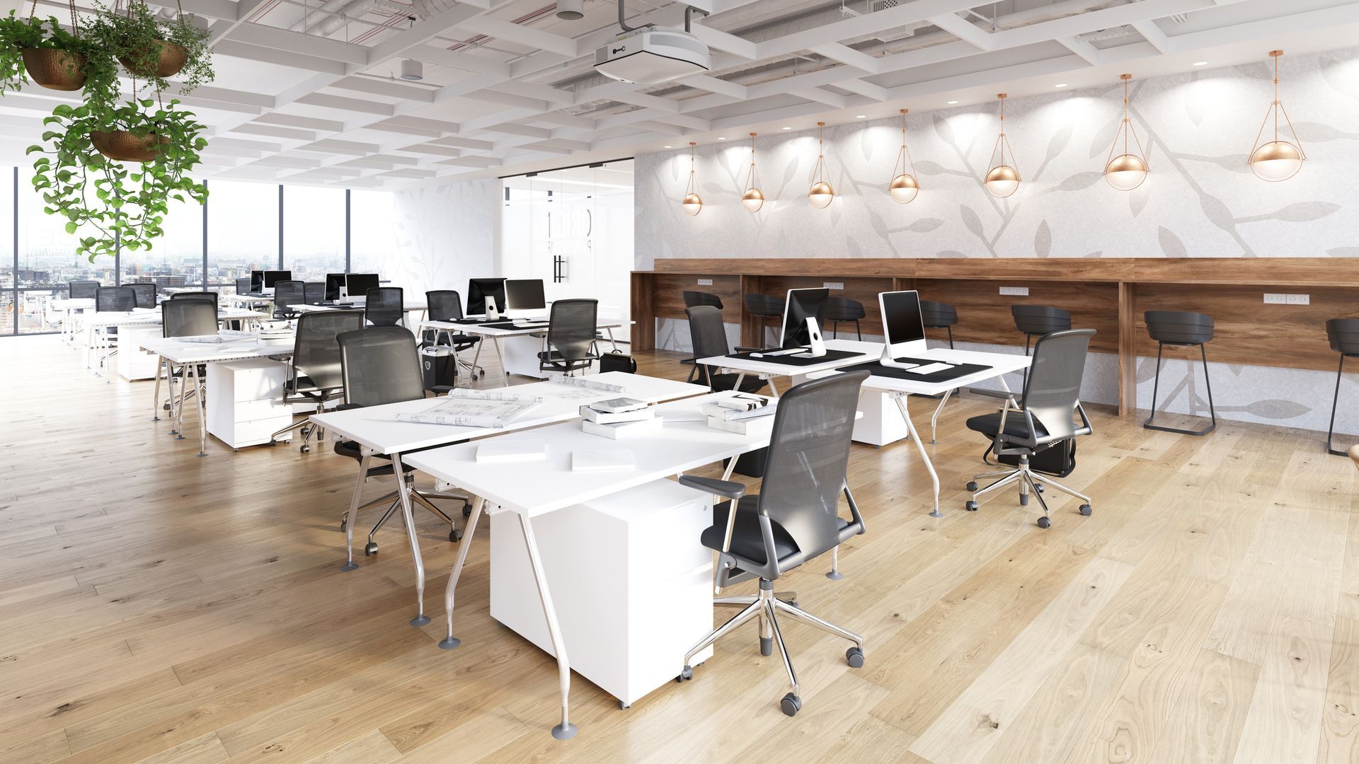 A large empty office with lots of desks and chairs.