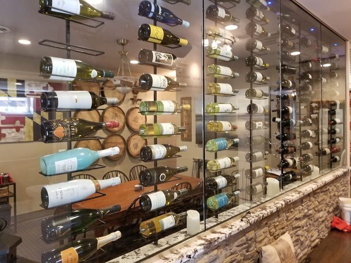 A wine cellar filled with lots of bottles of wine