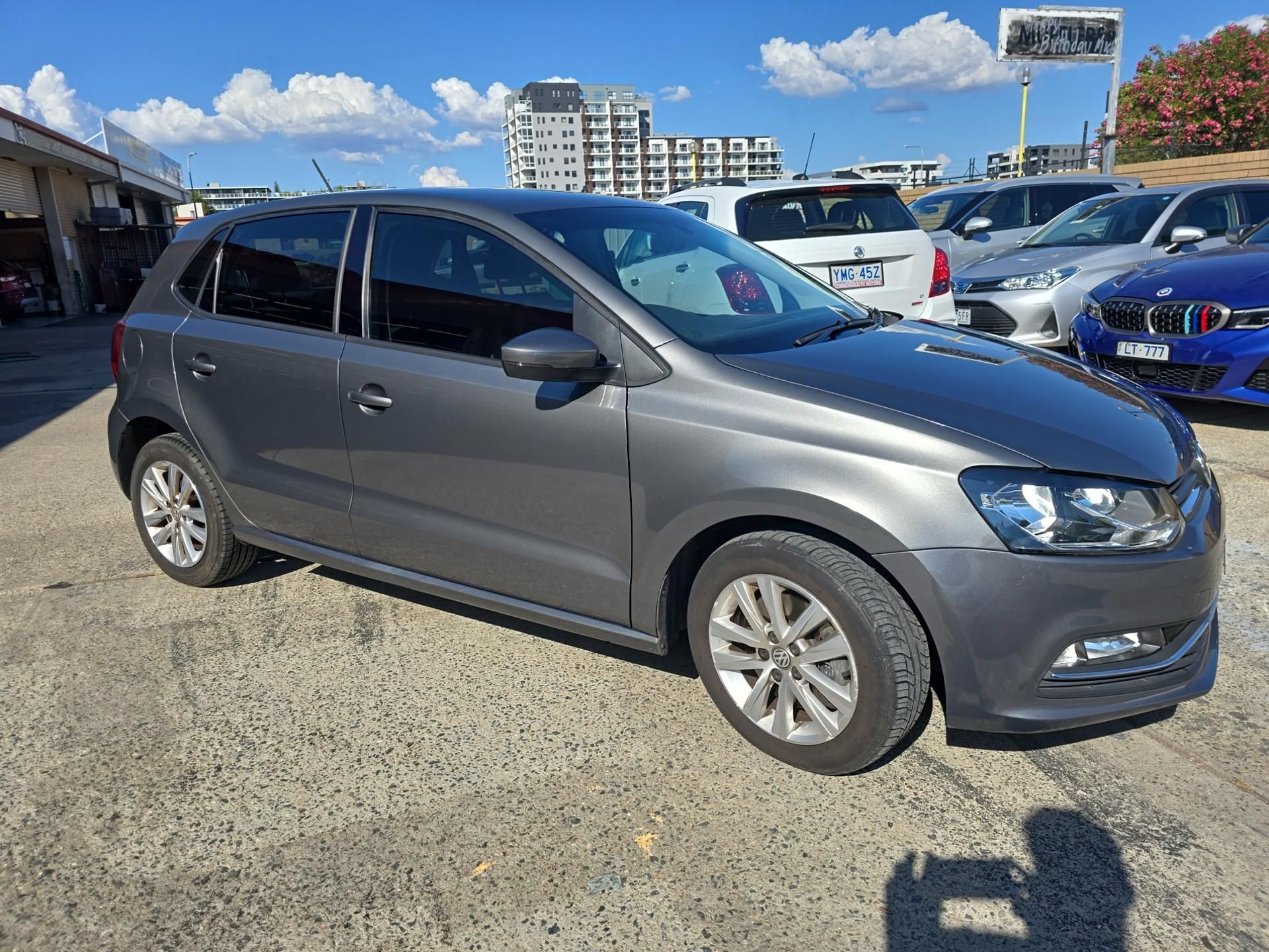 A Volkswagen Polo is parked in a parking lot — Southside Bodyworks in Greenway, ACT