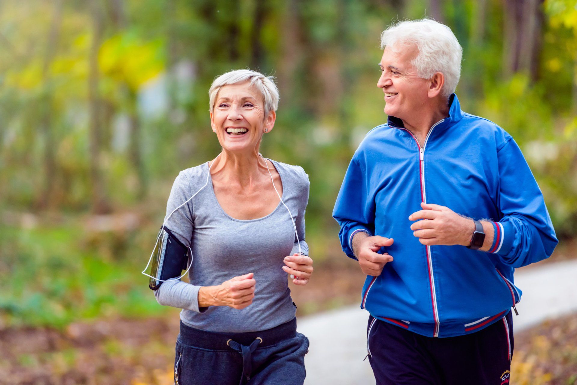 retired couple jogging at Timberhill Villa in San Antonio
