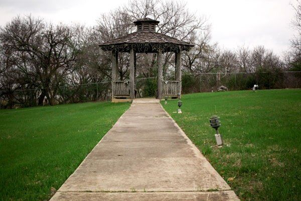 View of a pathway constructed in the garden