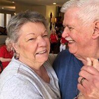 Elderly people having a fun time at an event organized by Timberhill Villa