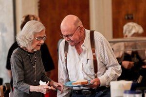 Elderly people having a fun time at  Timberhill Villa
