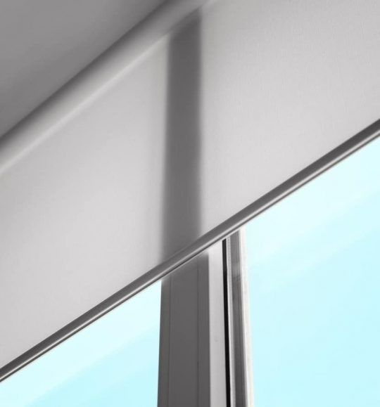 A Close Up of a Window With a White Blind on It — Budget Screens & Awnings in South Lismore, NSW