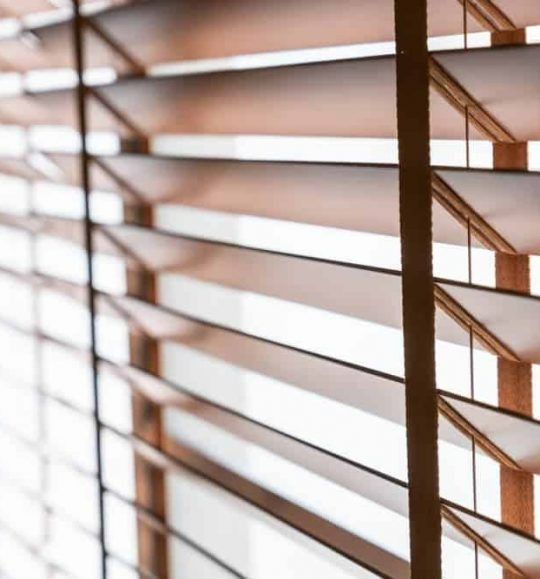 A Close Up of a Wooden Blind on a Window — Budget Screens & Awnings in South Lismore, NSW