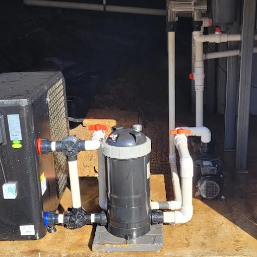 A Machine With A Lot Of Pipes Attached To It — Shannon Malone Plumbing In Gerringong, NSW