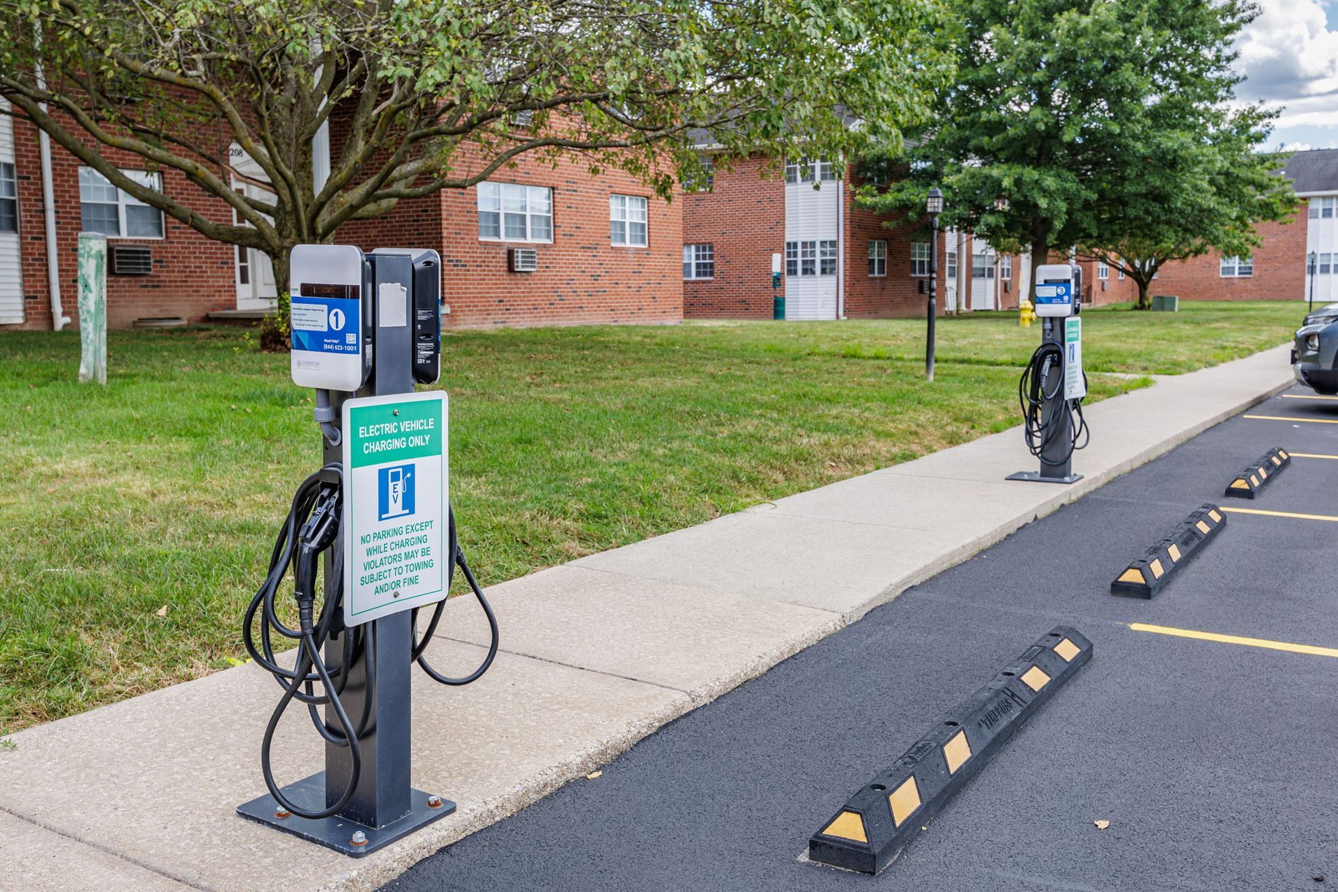 Electric vehicle charging ports