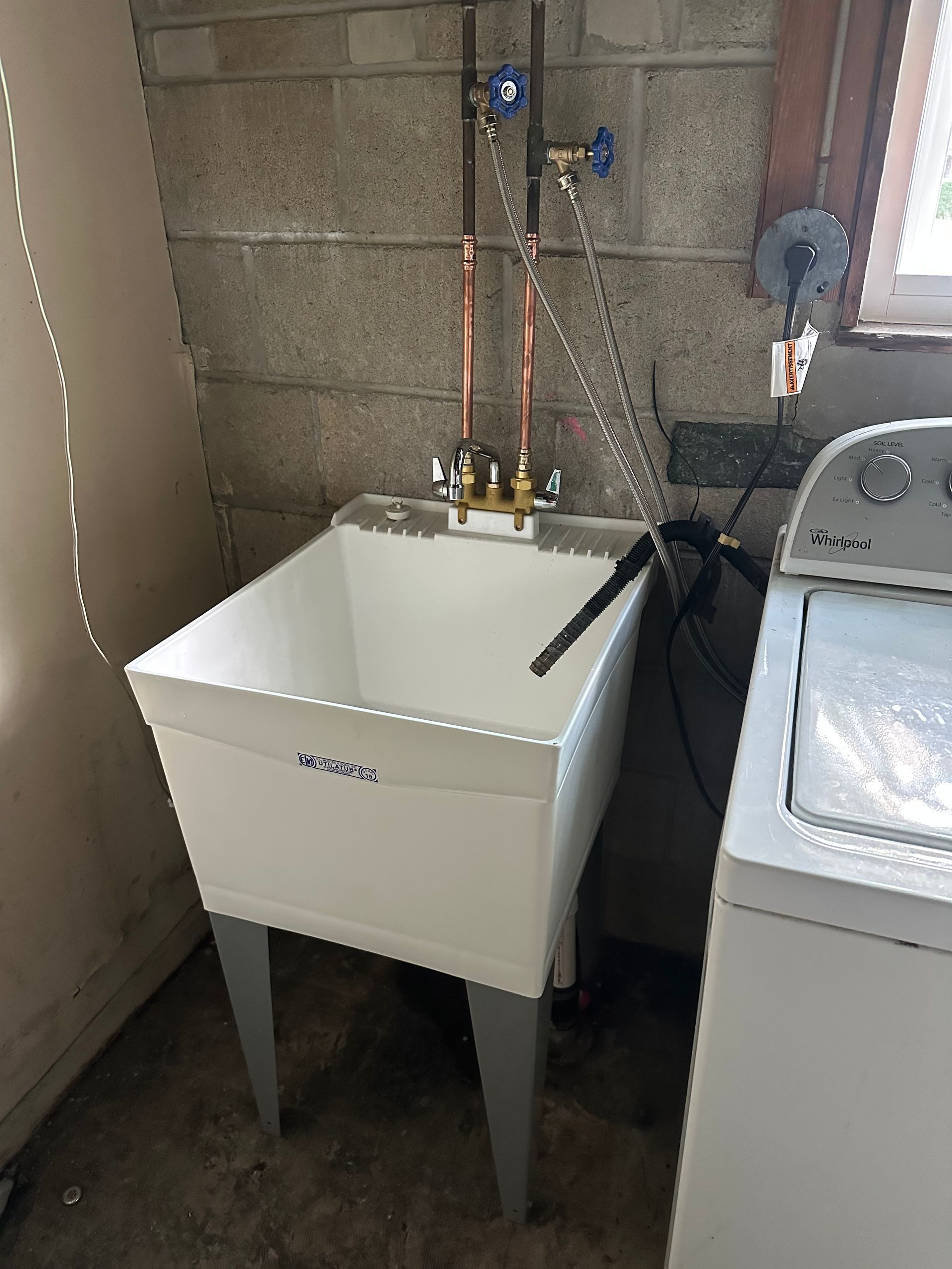 Shower head with water spraying down.