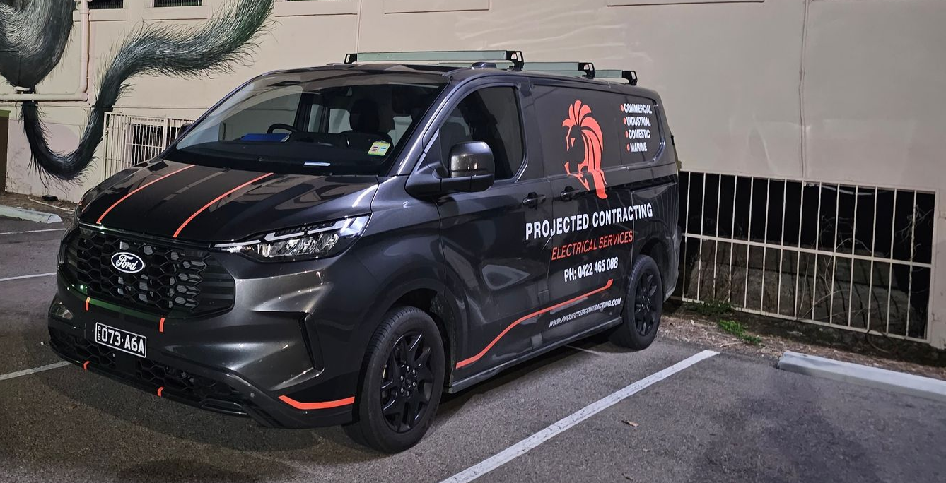 Electrician Testing Voltage in A Circuit Breaker Panel — Projected Contracting Electrical Services In Portsmith, QLD