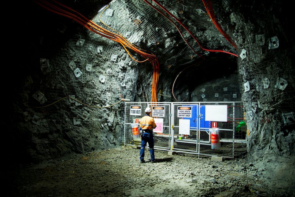 A Worker in A Mining Tunnel — Projected Contracting Electrical Services In Port Douglas, QLD