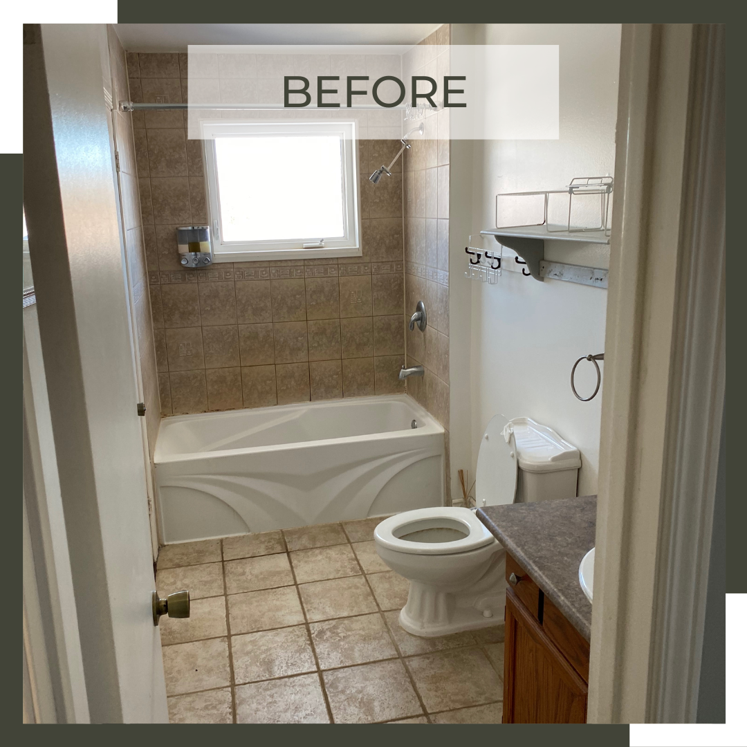 A bathroom with a tub , toilet , sink and window.