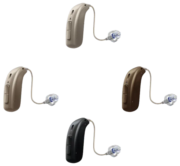 Four hearing aids are lined up in a circle on a white background