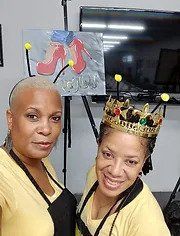 Two Girls Wearing Yellow Shirt With Apron — Los Angeles, CA — Paint Hive Studio