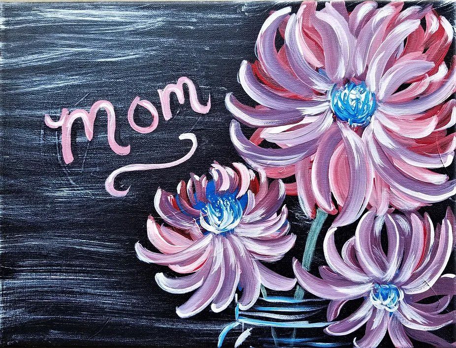 Pink flowers in a vase with the word