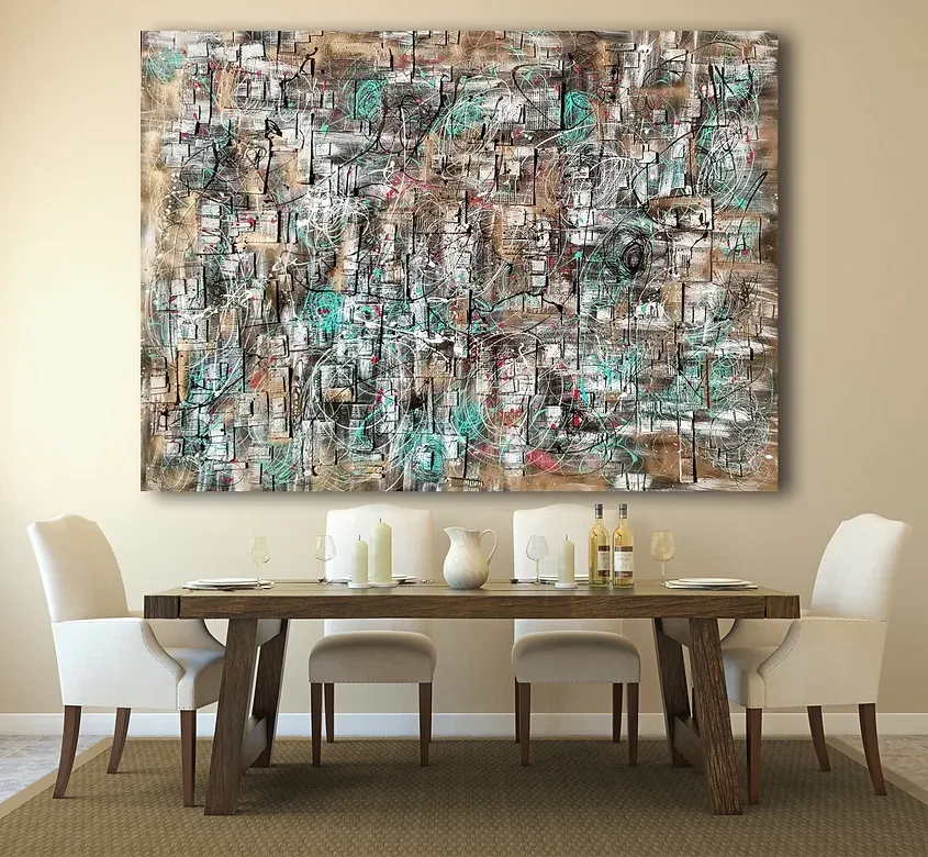 Abstract painting in a dining room, brown and turquoise with a wooden table and white chairs.