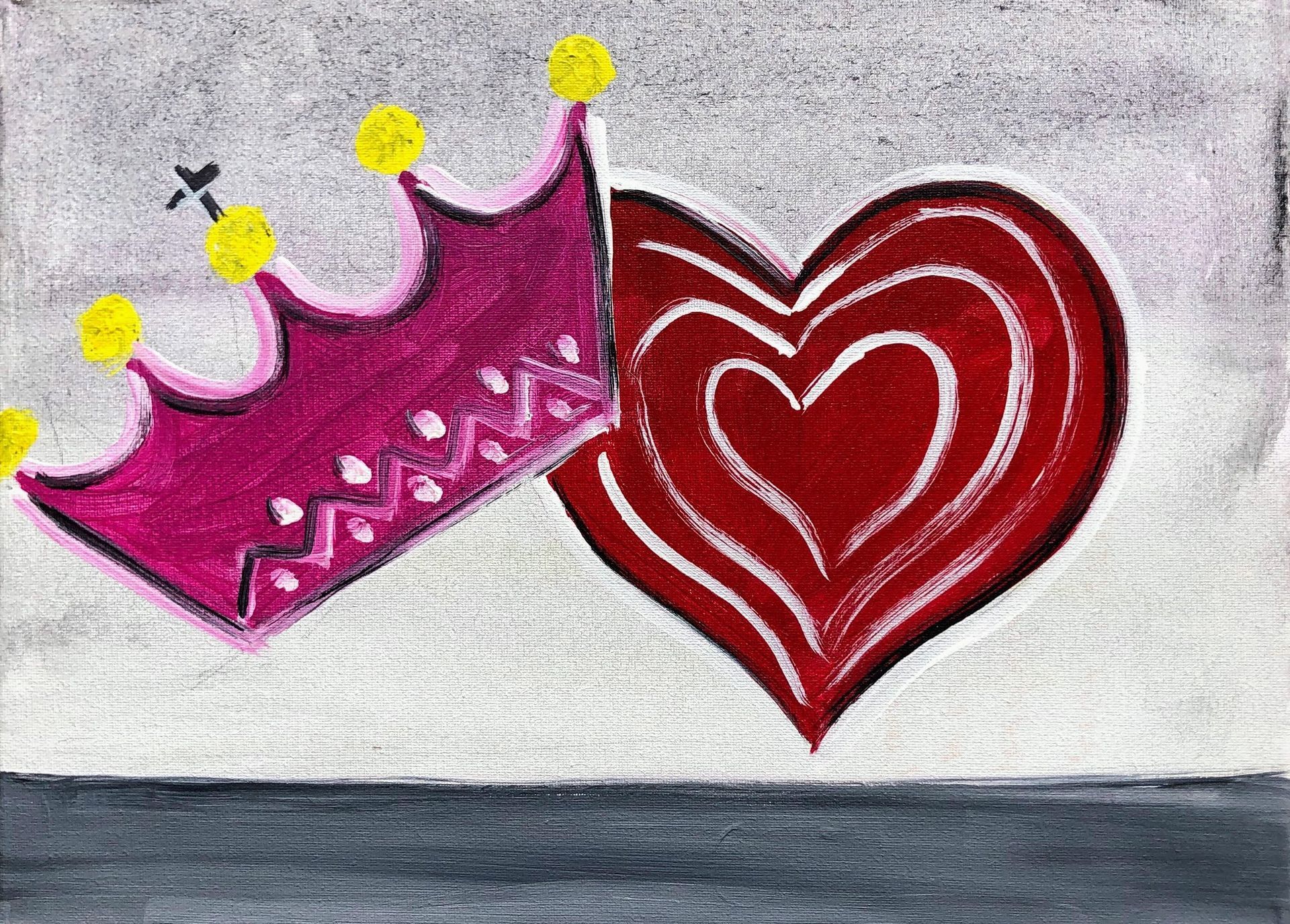 Pink crown next to a red heart, both on a gray and white background.