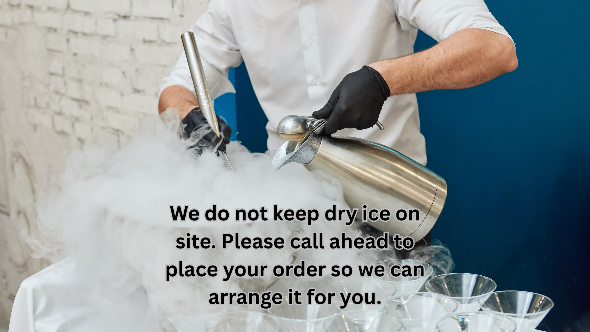 A close up of a glass of orange juice on a table.
