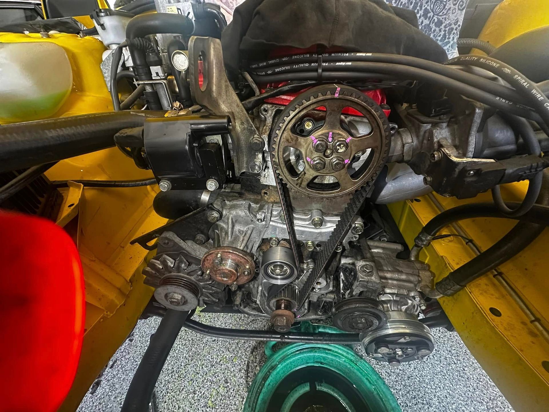 Engine Assembly in a Yellow Vehicle, Showing a Timing Belt — JDM Mobile Mechanical in Cabramatta, NSW