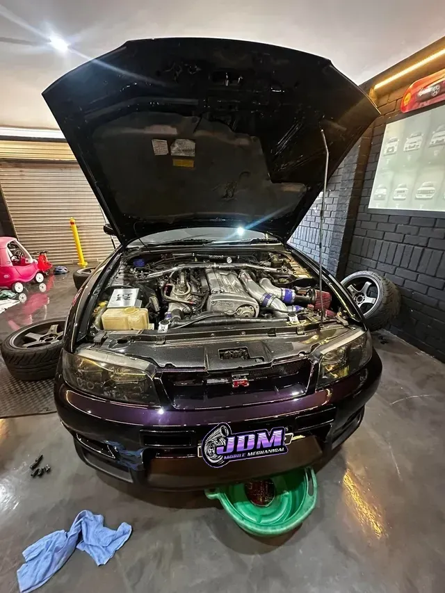 Purple Sports Car With Open Hood, Being Worked on in a Garage — JDM Mobile Mechanical in Moorebank, NSW