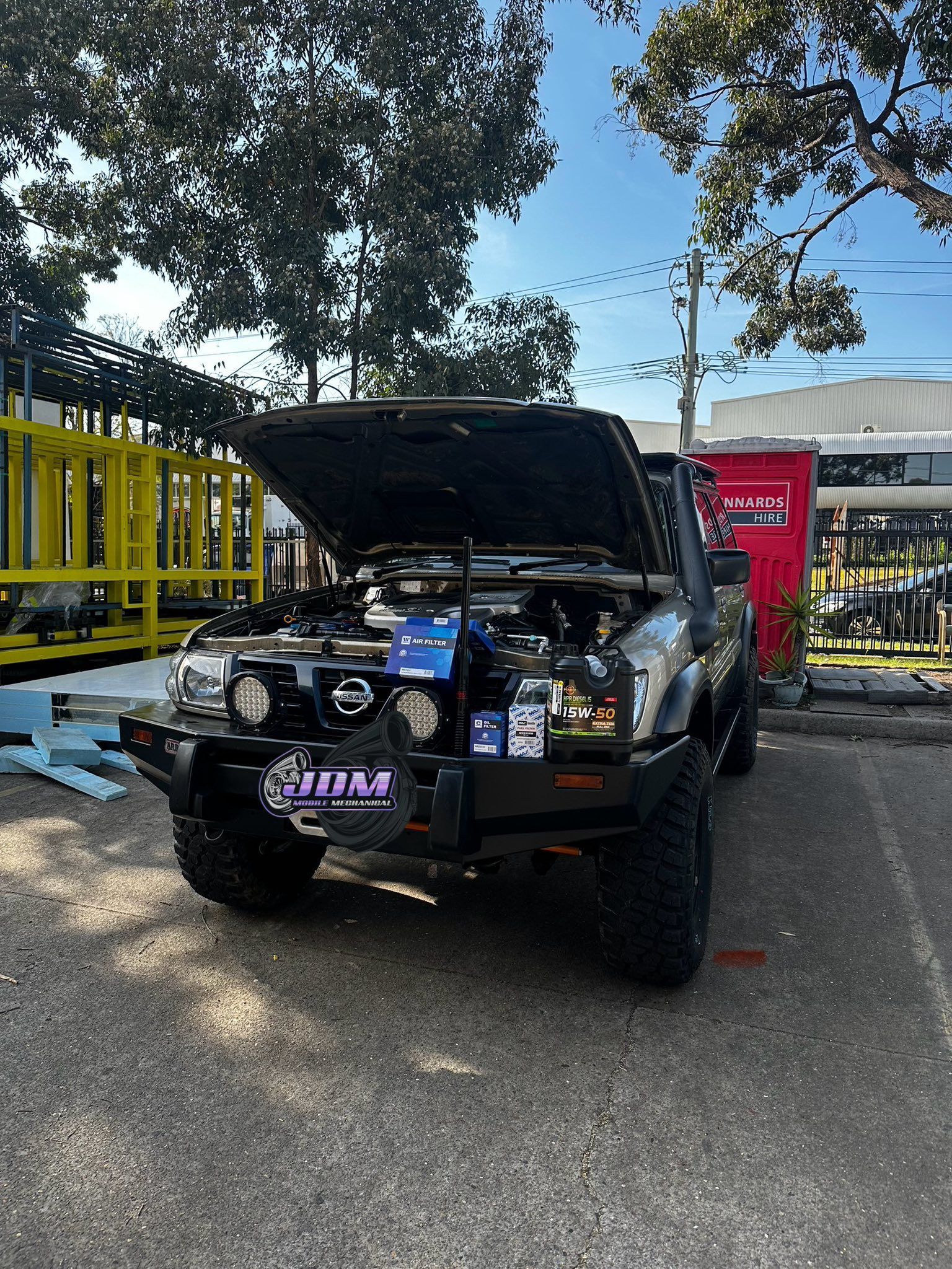 Dark-coloured Off-road Vehicle With the Hood Up — JDM Mobile Mechanical in Holsworthy, NSW