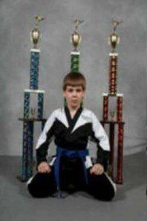 Student with trophies - Karate in Frederick, MD