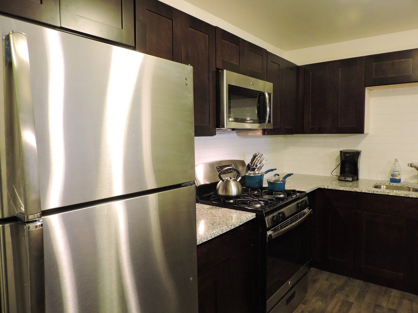 interior of kitchen with stainless steel appliances