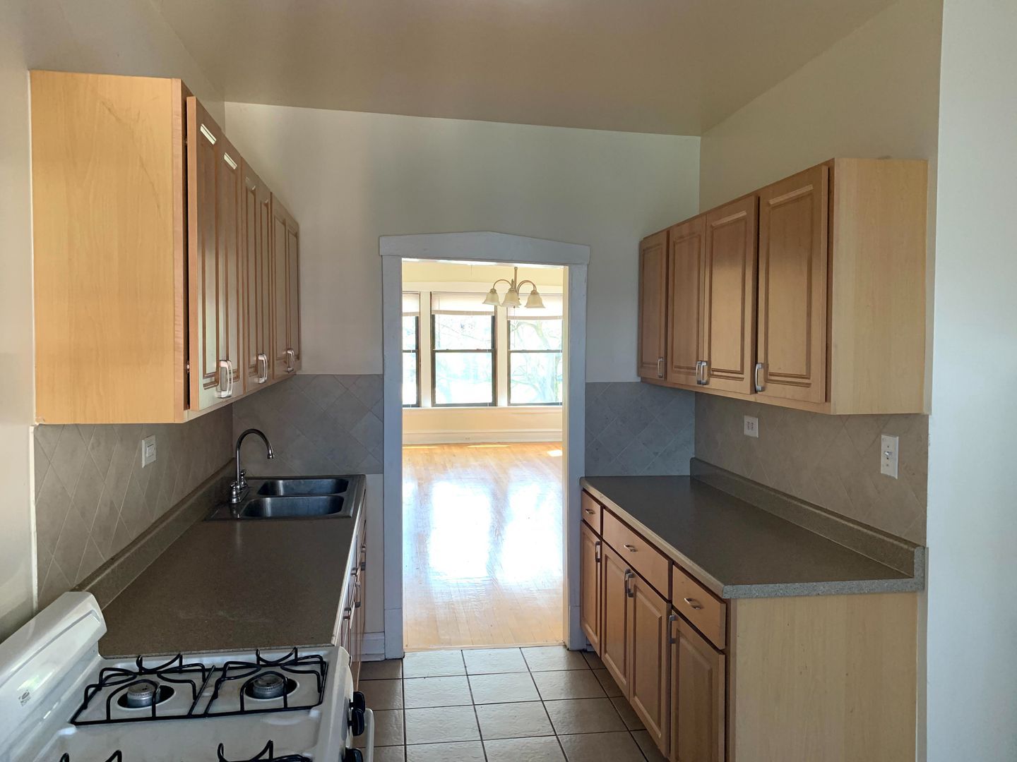 Kitchen with full appliances and large countertops