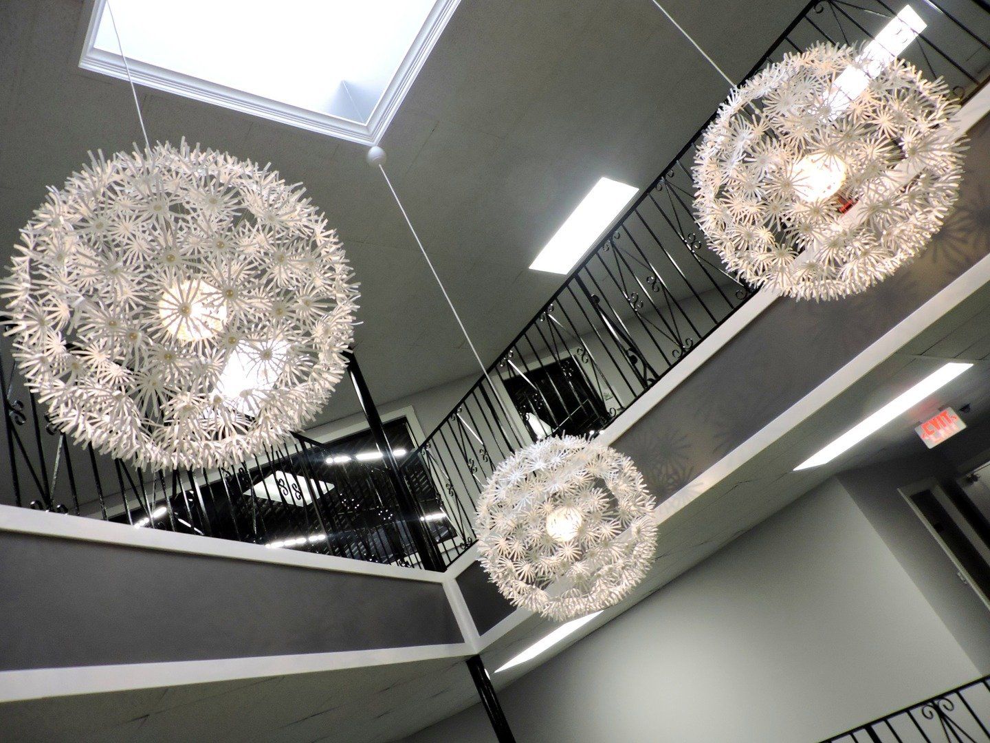 Intricate chandeliers hanging in the main entryway