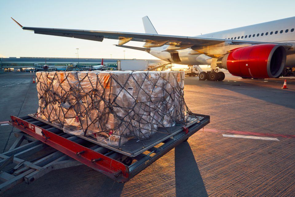 cargo being loaded onto a plane