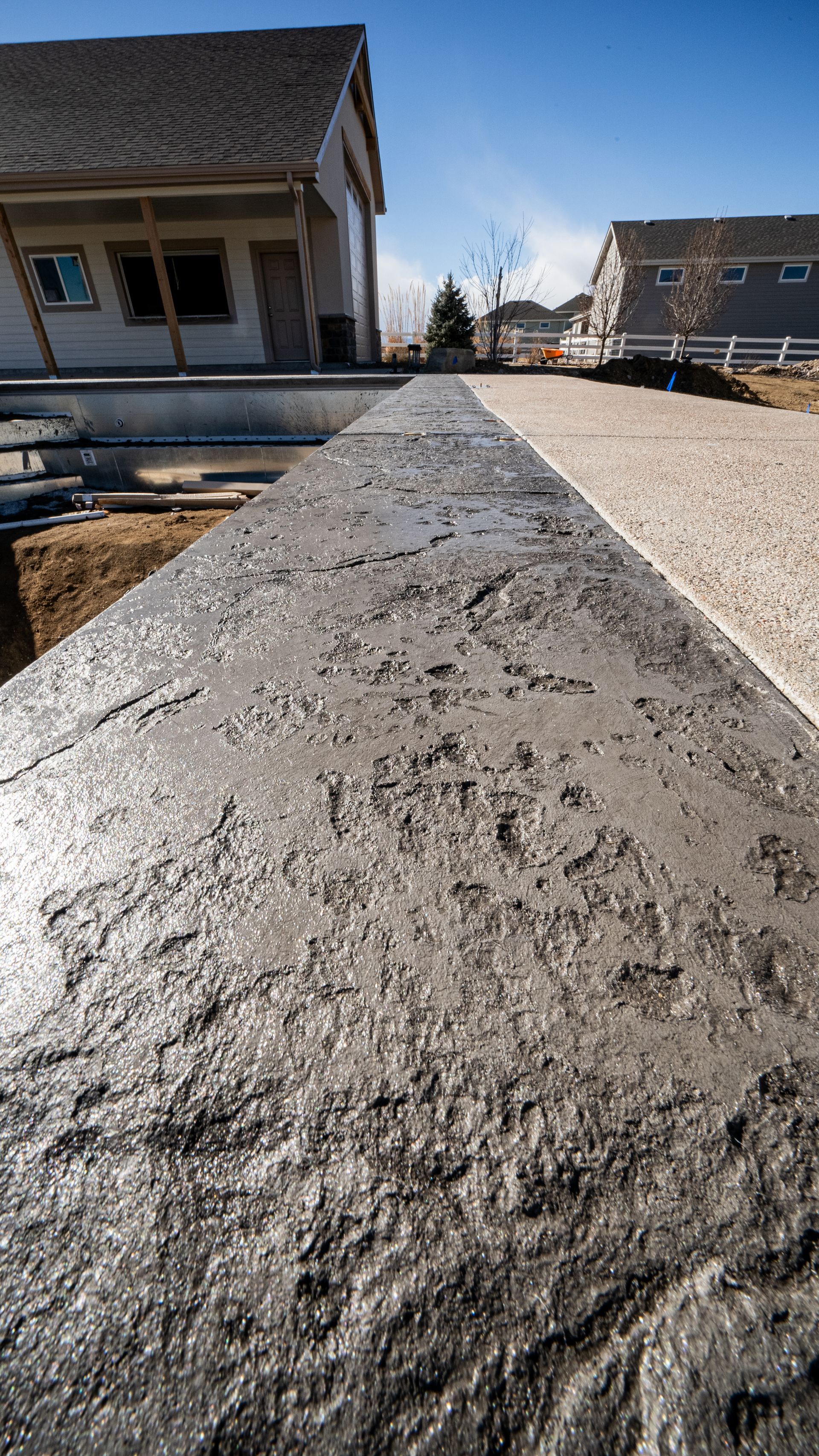 A close up of a gray stone floor with a geometric pattern.