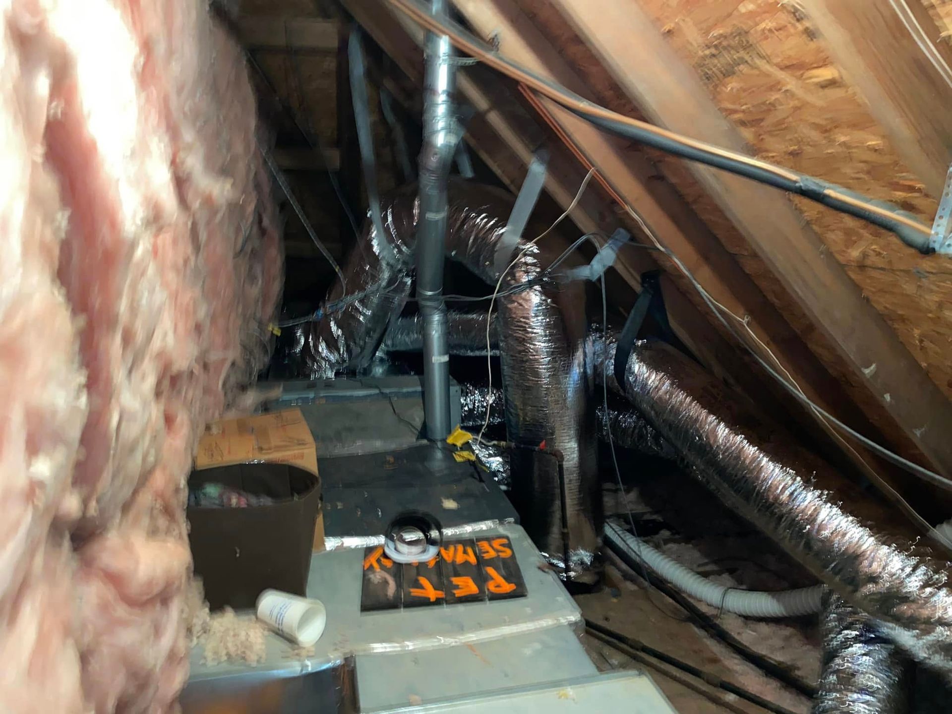 An attic with a sign that says pet on it