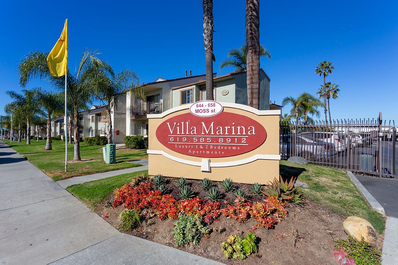 a sign for villa marina luxury & lifestyle apartments