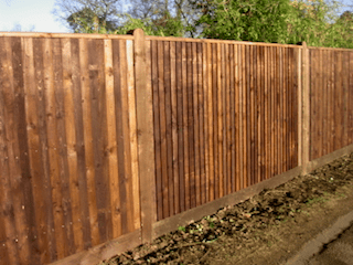 Some newly erected fencing. The panels have been installed and weatherproofed.