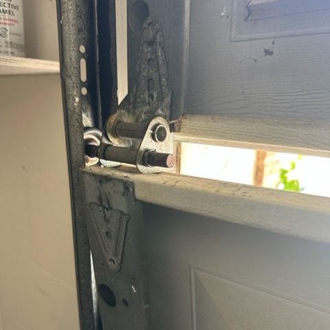 Broken Garage Door Hinge
