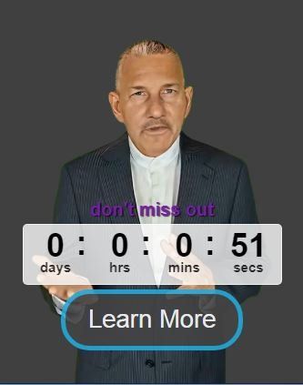 A man in a suit is standing in front of a timer that says learn more